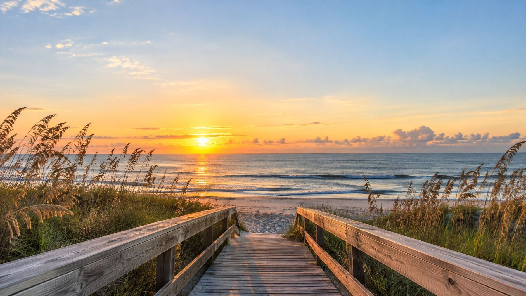 Sunrise over a dune boardwalk on the Space Coast